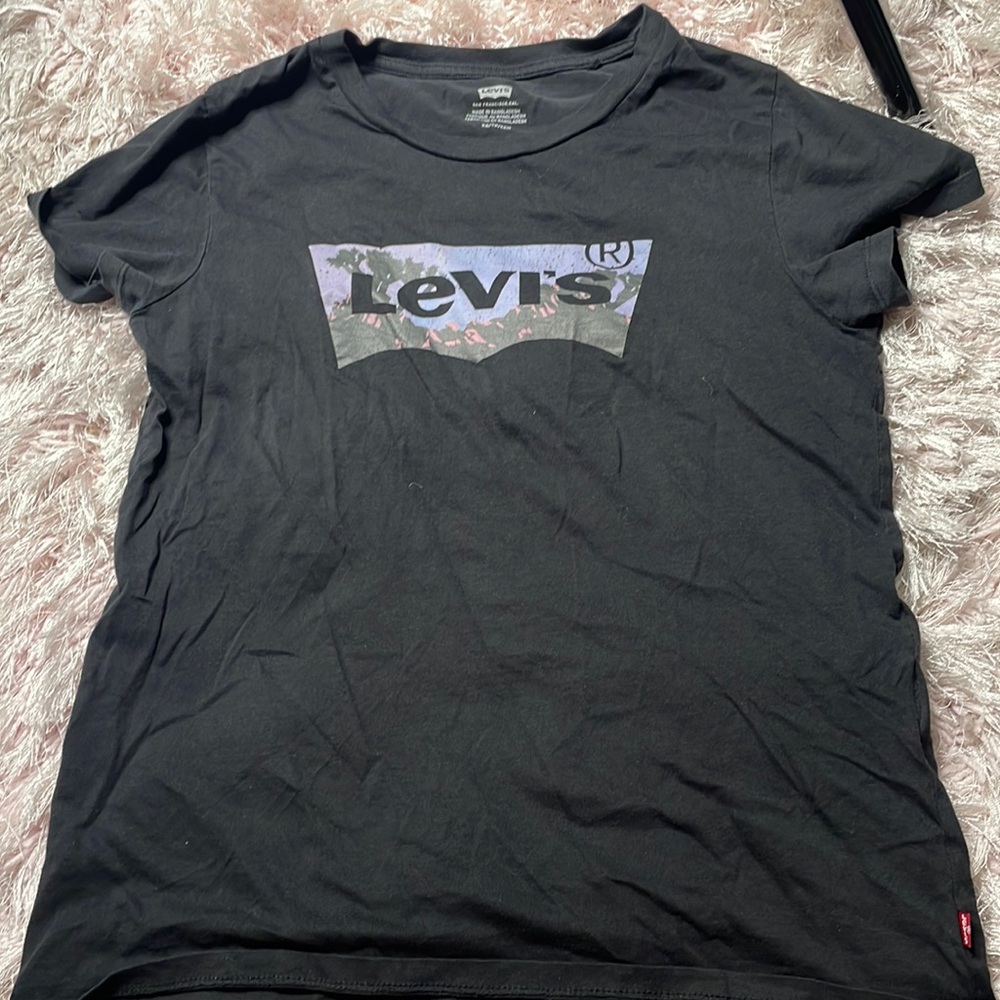 Levi’s black with a blue coloring